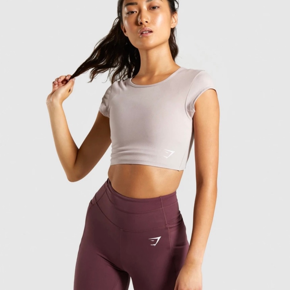 Gymshark active crop top. Worn less than a handful of times. Taupe